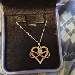 Elegant Gold and Silver Heart Pendant Necklace